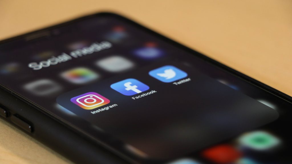 Social media apps on smartphone screen